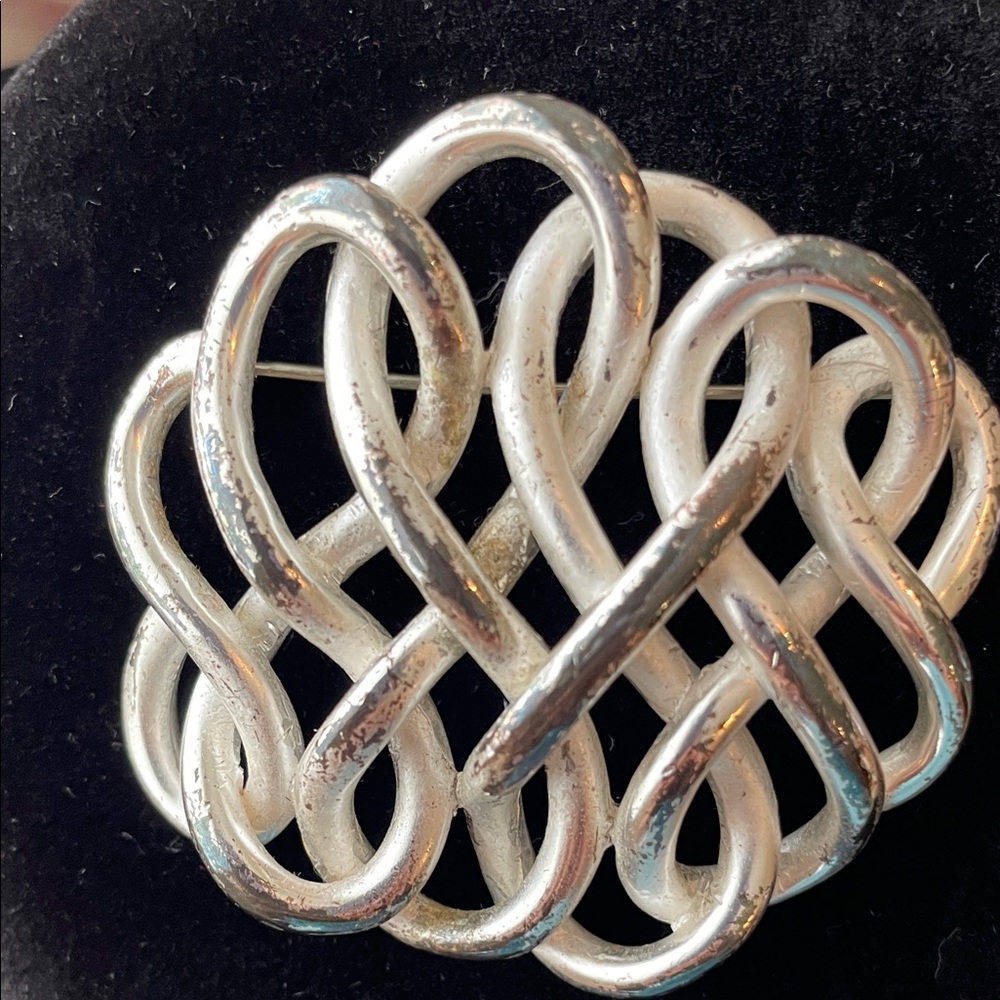 Elegant Silver Knot Brooch
